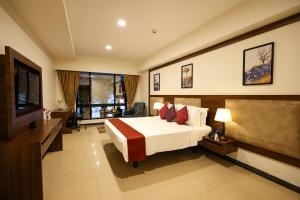 Hotel Tip Top International Pune Bedroom