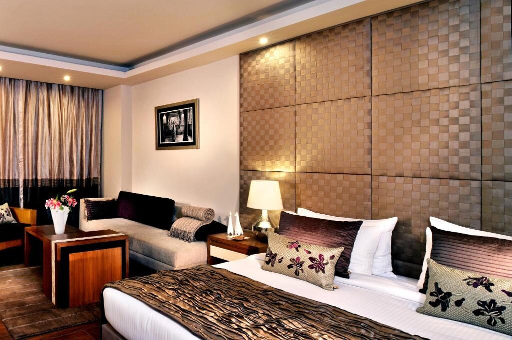 Udman Hotel Panchshila Park Bedroom