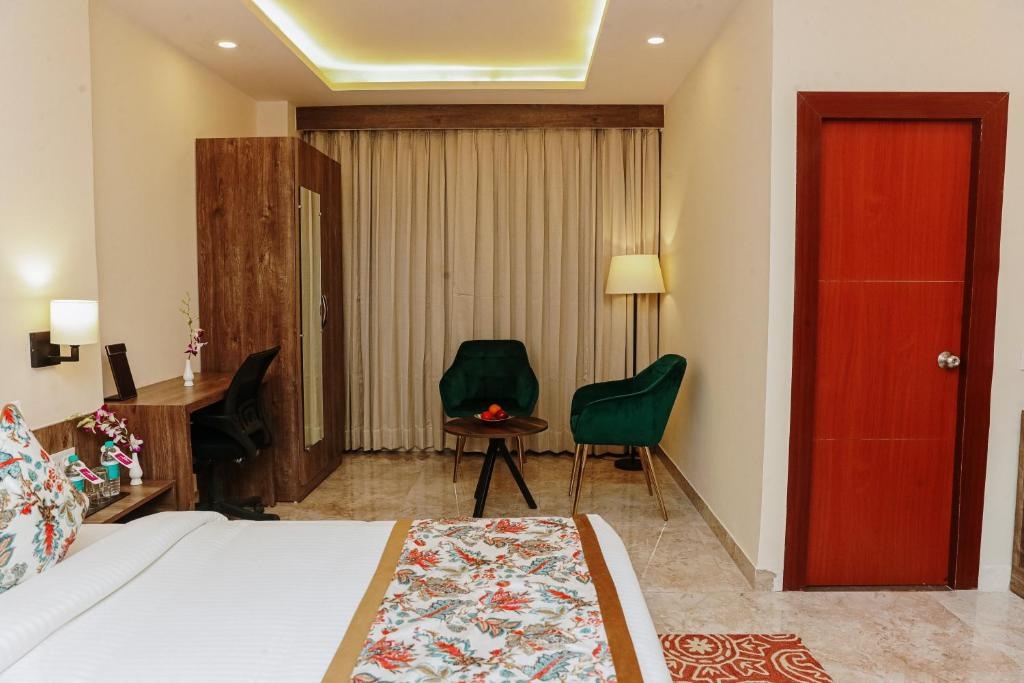 Hotel Regenta Inn Greater Noida Bedroom