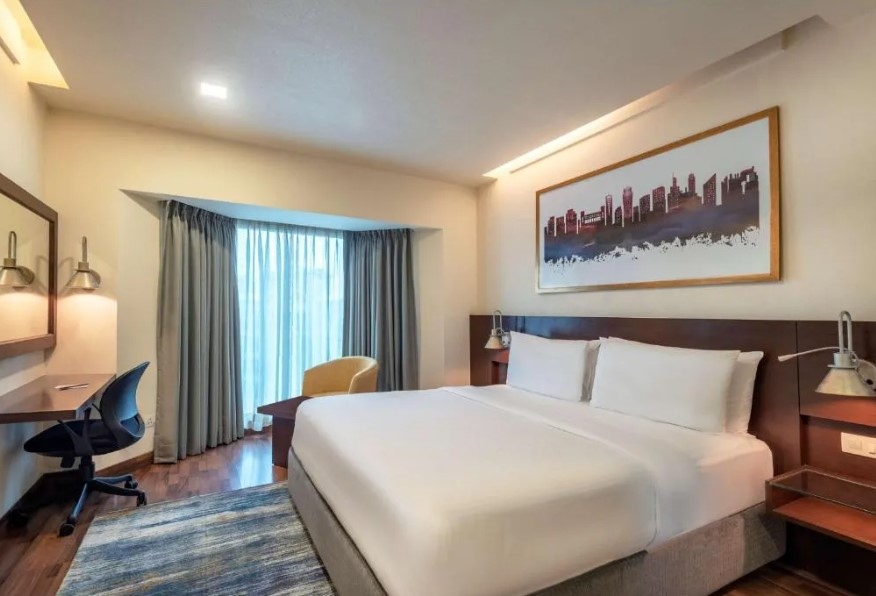 Radisson Sohna Road City Center Bedroom