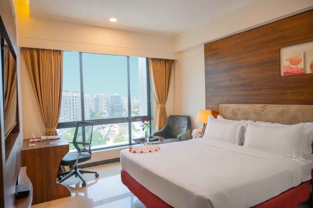 Hotel Tip Top International Pune Bedroom