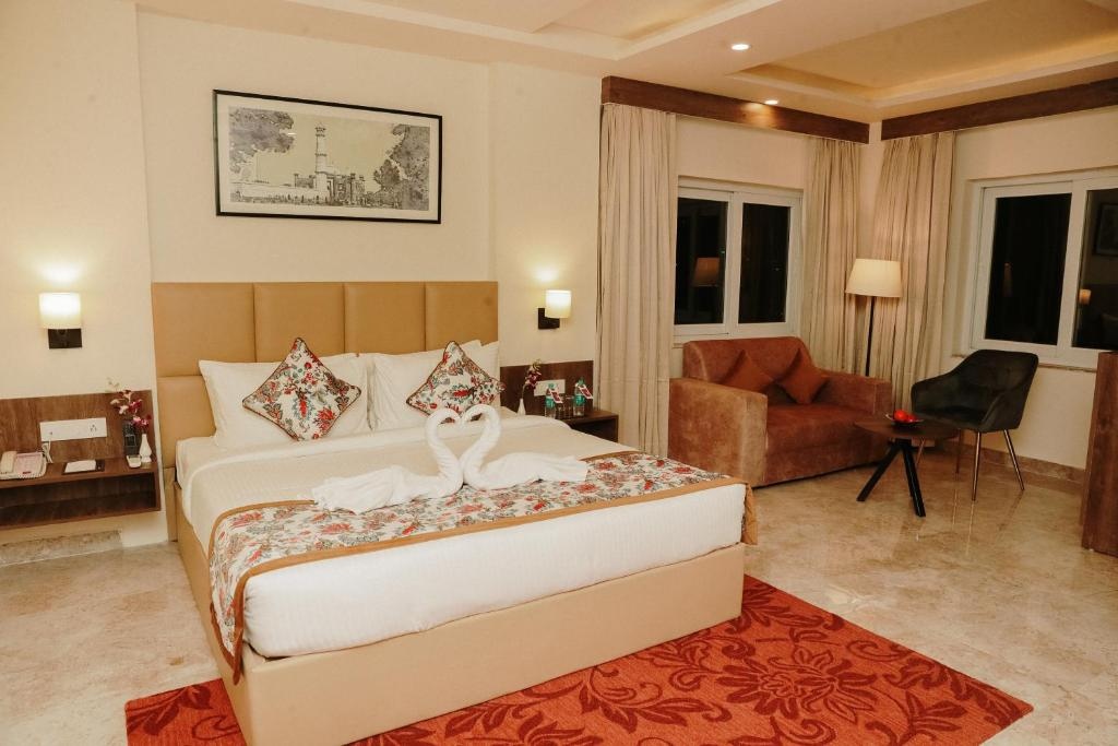 Hotel Regenta Inn Greater Noida Bedroom