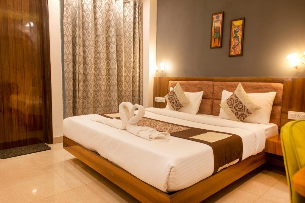 Hotel Posh Residency Bedroom 